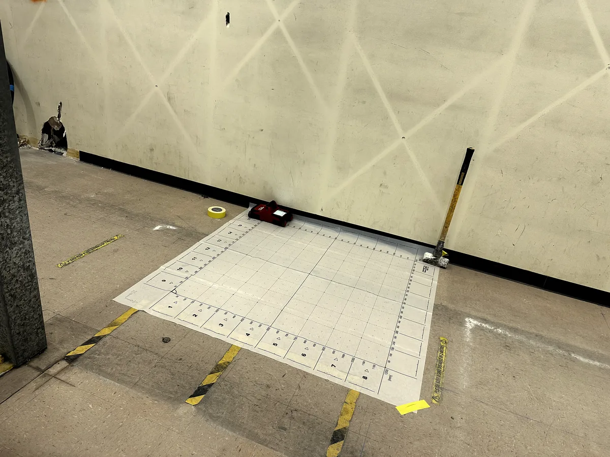 Ferroscan reference grid laid out on a concrete floor ready for scanning