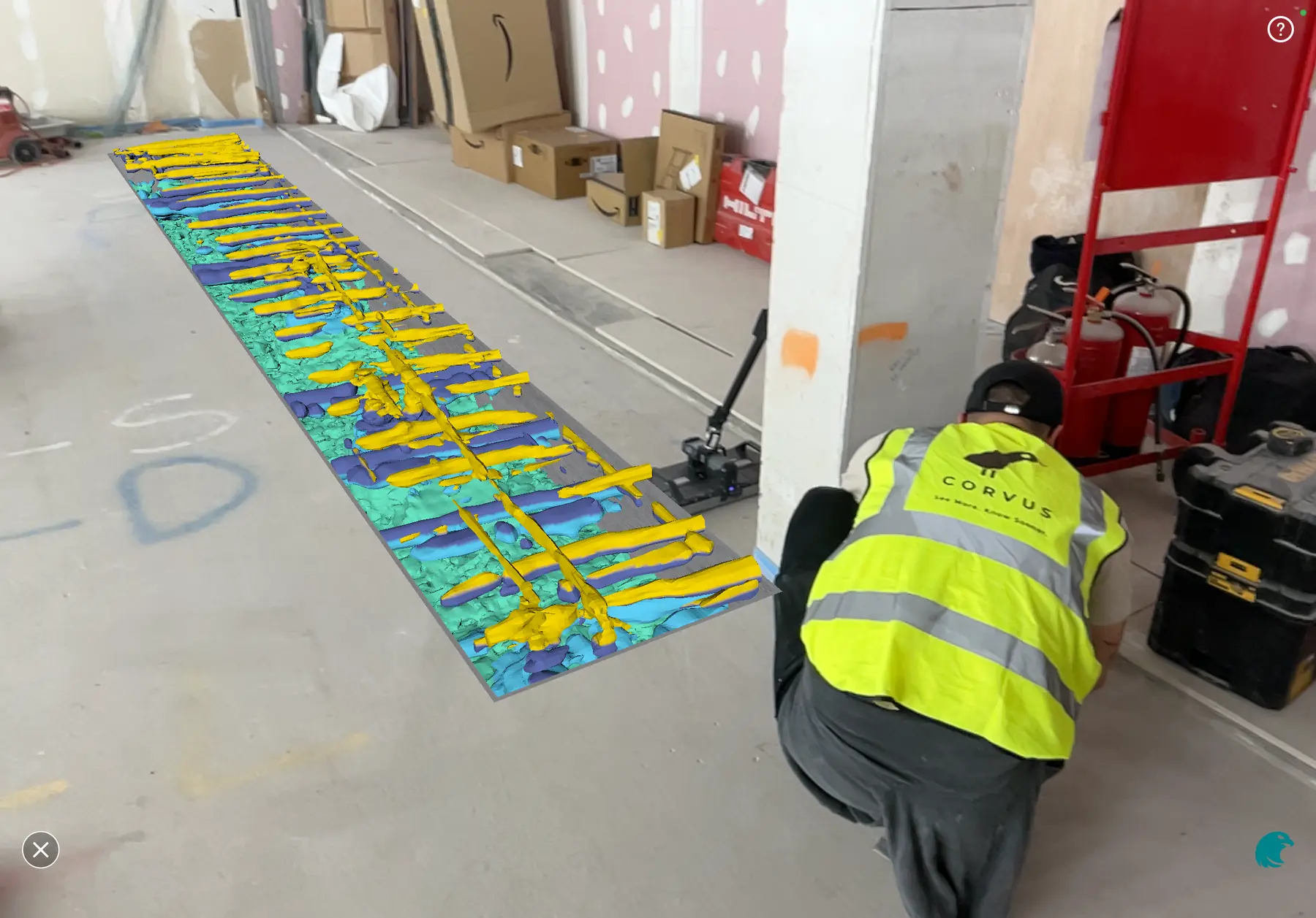 Corvus surveyor beside a GPR scan shown in augmented reality on a shop unit slab