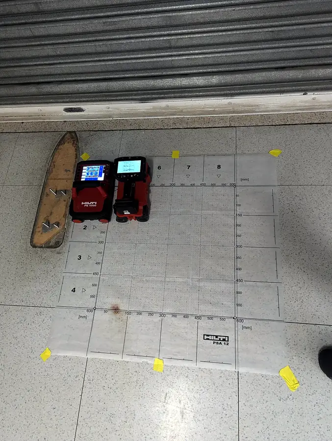 Scanners on the grid by the lift shaft